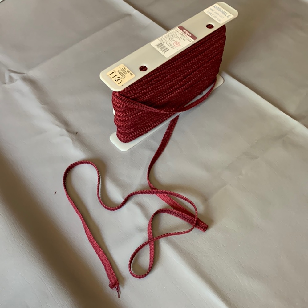 Sewing Appliqué in Maroon.